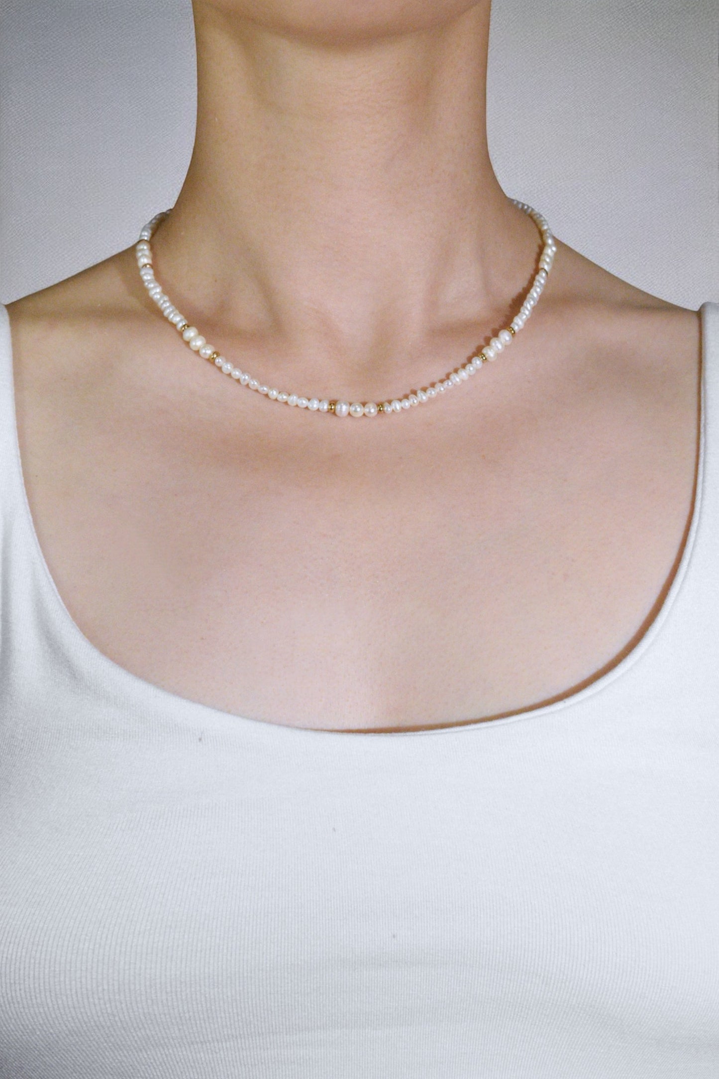 Pearl Necklace with Golden Light