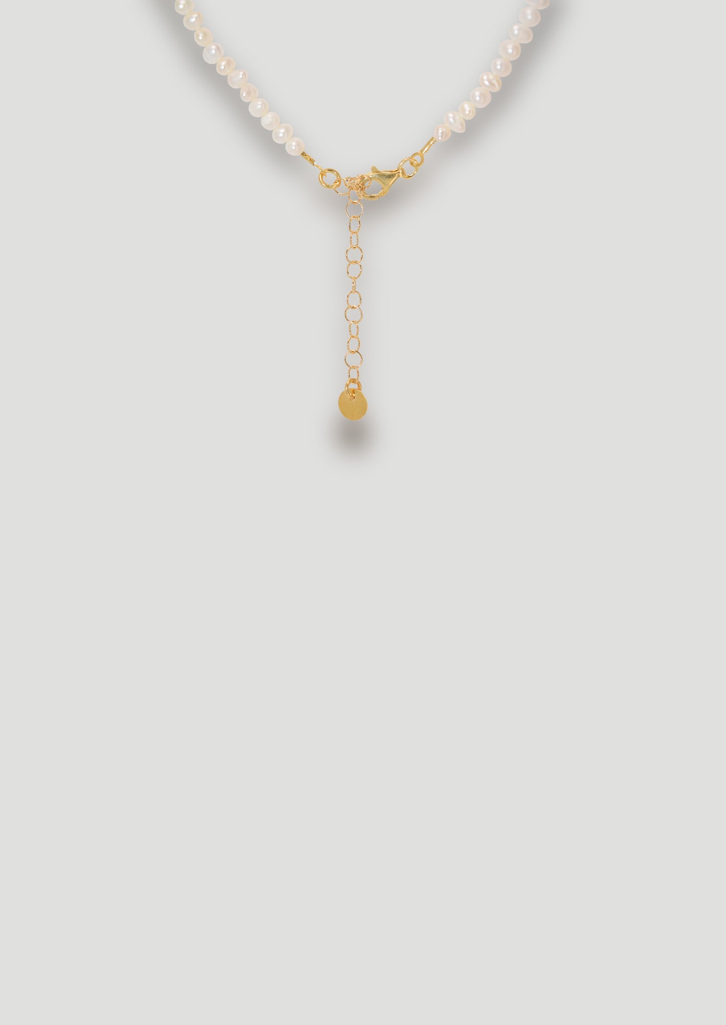 Pearl Necklace with Golden Light