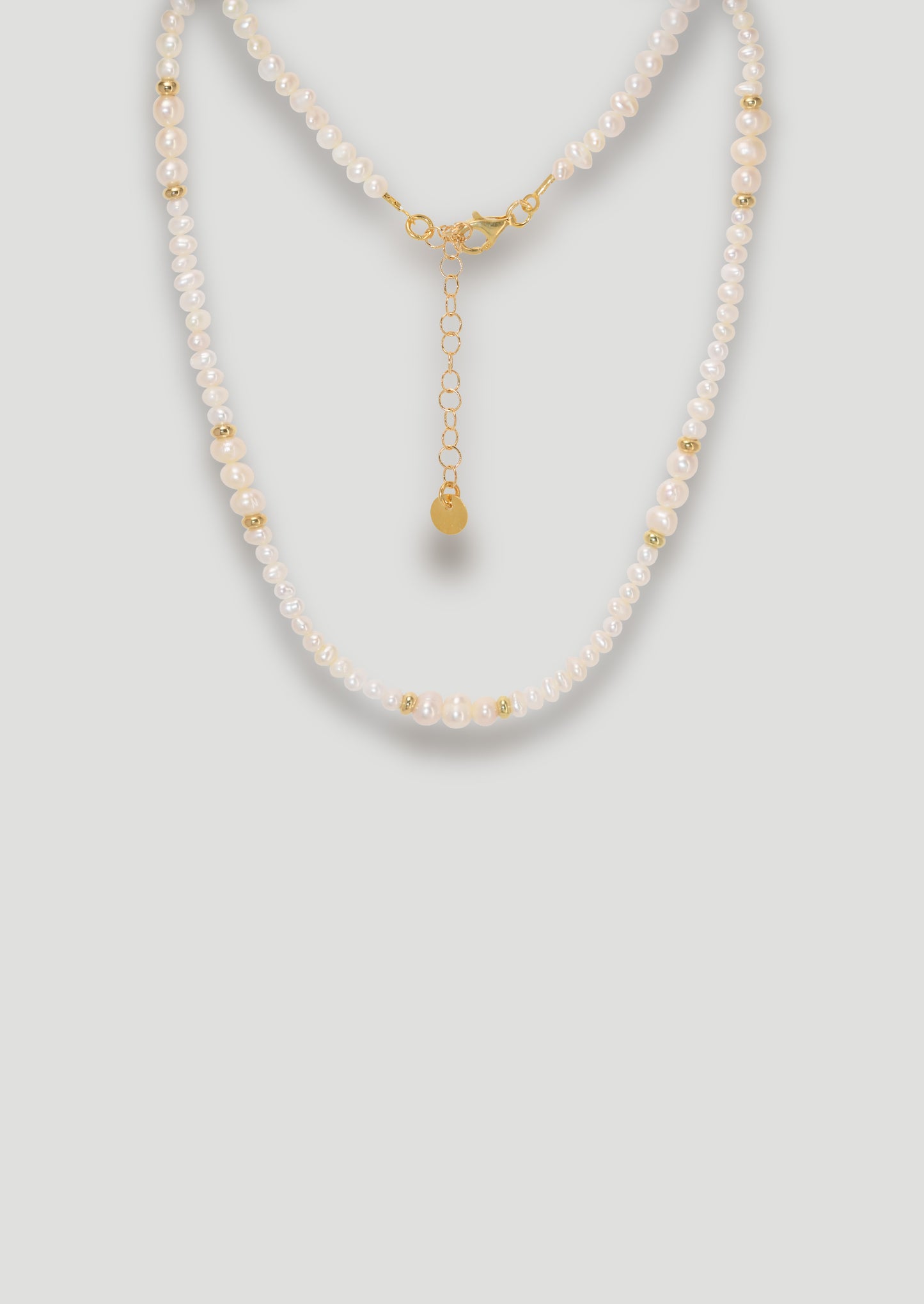 Pearl Necklace with Golden Light